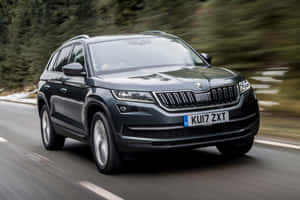 The Majestic Skoda Kodiaq Gliding Across The Highway. Wallpaper