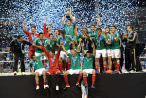 The Mexican National Soccer Team Proudly Poses For A Picture Before An International Match. Wallpaper