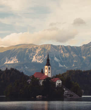 The Minaret Of Lake Bled's Church Wallpaper