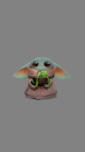 The Most Adorable Baby Yoda On An Iphone Wallpaper