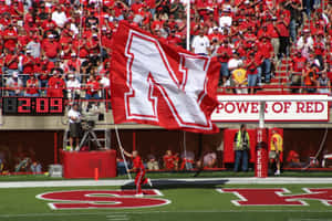 The Nebraska Cornhuskers Bring The Heat To Memorial Stadium Wallpaper