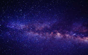 The Night Sky Illuminated By Blue Stars Wallpaper