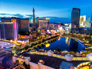 The Night-time Las Vegas Skyline Of Bright Lights And Spectacular Views. Wallpaper