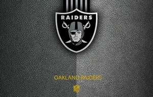 The Oakland Raiders In Action Wallpaper