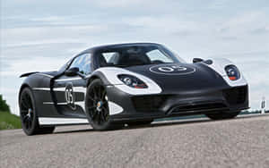 The Powerful And Elegant Porsche 918 Spyder In Action Wallpaper