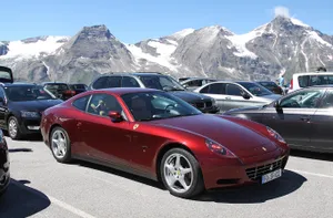 The Powerful Elegance Of A Ferrari 612 Scaglietti In Action. Wallpaper