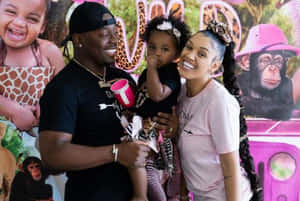 The Prince Family Celebrating Together At Home Wallpaper