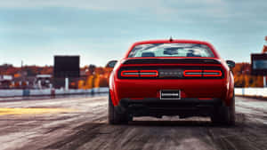 The Rear End Of A Red Dodge Challenger Wallpaper