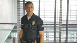 The Rookie Officer Standing Wallpaper