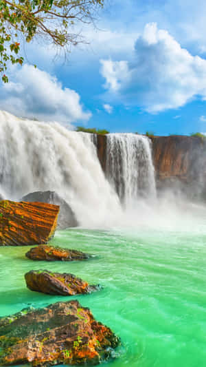 The Serene Beauty Of A Waterfall And Iphone Wallpaper