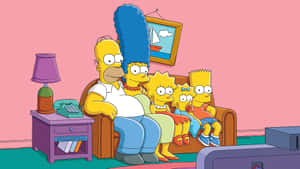 The Simpsons Family Sitting On A Couch Wallpaper