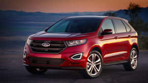 The Sleek And Stylish Ford Edge Suv Driving On A Scenic Route Wallpaper