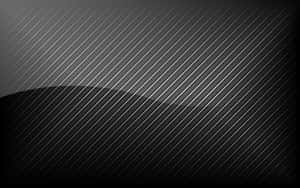 The Sleek Look Of Black Carbon Fiber Wallpaper