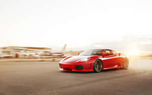 The Sleek Red Ferrari F430 In All Its Glory Wallpaper