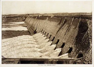 The Spectacular Aswan High Dam In Its Vintage Glory Wallpaper