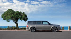 The Stunning Ford Flex Cruising At Sunset Wallpaper