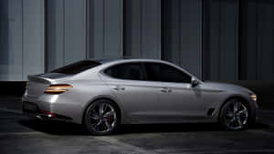 The Stylish And Powerful Genesis G70 Luxury Sedan In Action Wallpaper