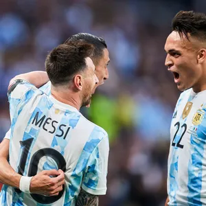 Thiago Almada With Teammate Superstar Messi Wallpaper