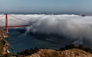 Thick Fog Rolling In Golden Gate Bridge Wallpaper