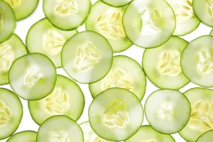 Thinly Sliced Fresh Cucumber Fruits Wallpaper