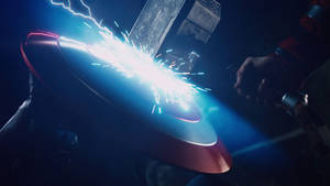 Thor Hammer Against Captain America's Shield Wallpaper