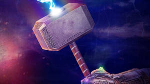 Thor Hammer Held By The Gauntlet Wallpaper