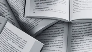 Thought-provoking Black And White Book On A Table Wallpaper