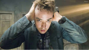 Thoughtful John Cusack Posing For A Photoshoot Wallpaper