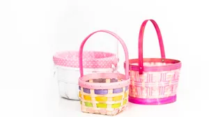 Three Baskets With Handles On A White Surface Wallpaper
