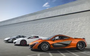 Three Mclaren Spyder Vehicles Parked Wallpaper