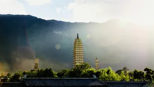 Three Pagodas With Lens Flare Wallpaper