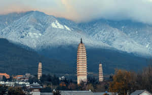 Three Pagodas With Mountain View Wallpaper