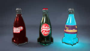 Three Soda Bottles With Different Colors Wallpaper