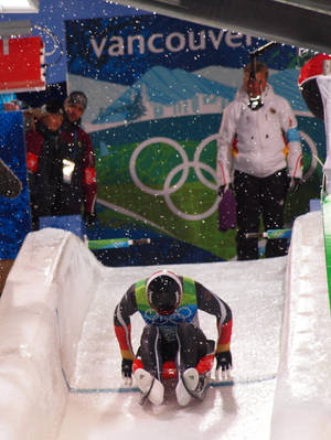 Thrilling Action At The Vancouver 2010 Luge Event Wallpaper