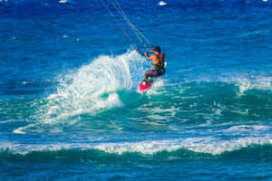 Thrilling Beach Water Sports Adventure Wallpaper