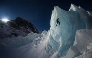 Thrilling Ice Climbing Adventure Wallpaper