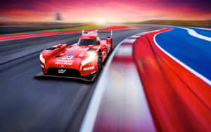 Thrilling Speed On The Race Track Wallpaper