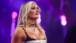 Tiffany Stratton In Wrestling Spotlight Wallpaper