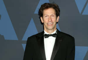 Tim Blake Nelson At A Photoshoot Wallpaper