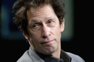 Tim Blake Nelson Posing For A Portrait Wallpaper