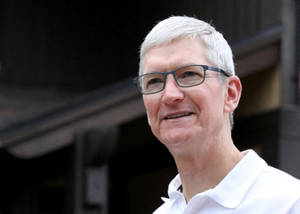 Tim Cook, Ceo Of Apple Inc. In A Formal Meeting Wallpaper