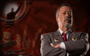 Tim Curry In A Iconic Role As A Mysterious Entertainer Wallpaper