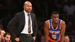 Tim Hardaway Jr. And Coach Derek Fisher Wallpaper