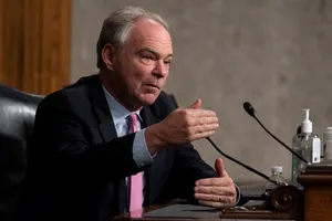 Tim Kaine Gesturing With Both Hands Wallpaper
