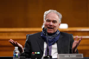 Tim Kaine Shrugging While Talking Wallpaper