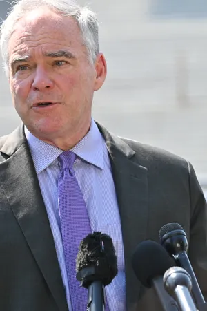 Tim Kaine With Purple Tie Wallpaper