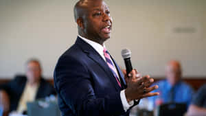 Tim Scott Delivering A Speech At A Public Event Wallpaper