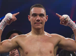 Tim Tszyu In Action During A Boxing Match Wallpaper