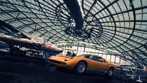 Timeless Beauty: Lamborghini Miura In Stunning Yellow Wallpaper