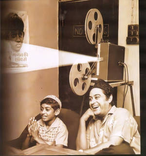 Timeless Bonding Of Kishore Kumar And His Son Wallpaper